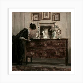 Woman Looking At A Dresser Art Print