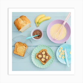 Breakfast with French toast with chocolate spread and banana shot from above Art Print