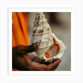 Man Holding A Seashell Art Print