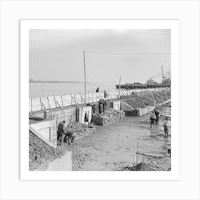 Piling Sandbags Along The Levee During The Height Of The Flood, Cairo, Illinois By Russell Lee Art Print