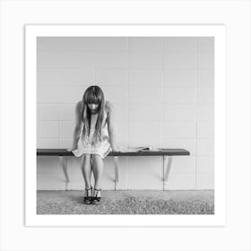 Girl Sitting On A Bench Art Print