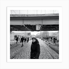 Woman On A Bridge In Riga Art Print