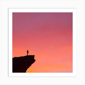 Silhouette Of A Man Standing On A Cliff Art Print