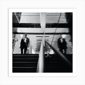 Man Walking Down Escalator Art Print