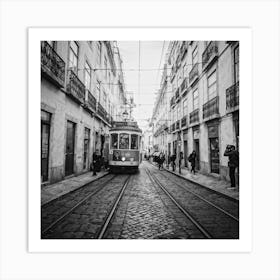 Black And White Photo Lisbons Vintage Tramway Weaving Through Narrow Historic City Streets Tram D Art Print