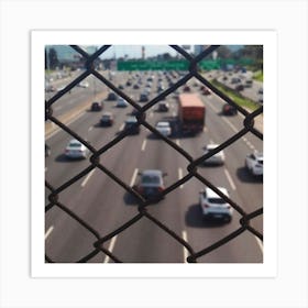 Traffic Through A Chain Link Fence Art Print