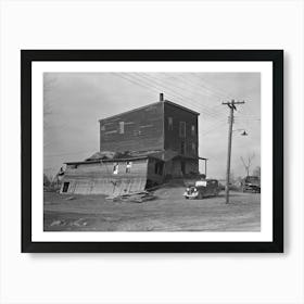 Old Flour Mill Damaged By The Flood, Note Wrought Iron Streetlight Fixture, Shawneetown, Illinois By Russell Lee Art Print