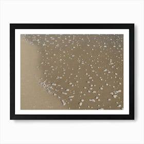 Water bubbles on the sandy beach Art Print