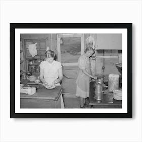 Mother And Daughter Working In The Kitchen Of The Cafe At Pie Town, New Mexico, The Daughter With Her Husban Art Print