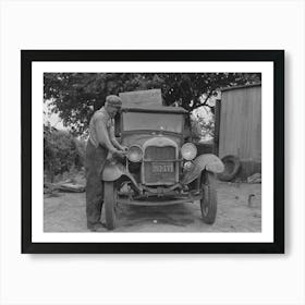 Untitled Photo, Possibly Related To Elmer Thomas, Migrant To California, Tying Sack Of Laundry Onto Front Lamp Art Print