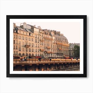 Paris Buildings By The Seine Bathed In Golden Light Art Print