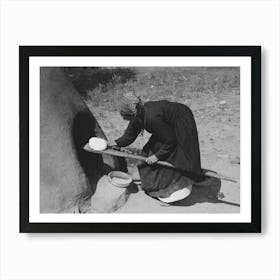 Spanish American Woman Putting Loaf Of Bread Into Oven, Taos County, New Mexico By Russell Lee Art Print