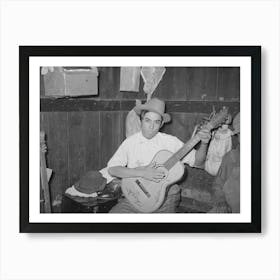 Mexican Boy Playing Guitar In Room Of Corral, Robstown, Texas By Russell Lee Art Print