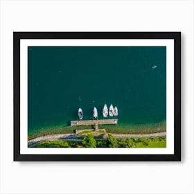 Yachts and sailboats from above, moored on Lake Orta. Piedmont, Italy. Drone photography. Art Print