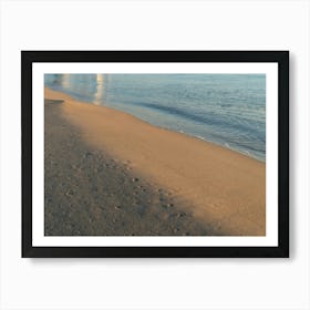 Sea water and traces on the sandy beach Art Print