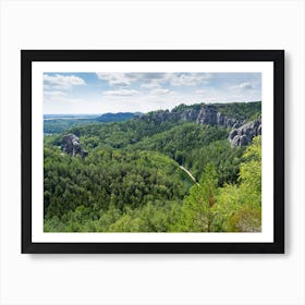 Sandstone rocks and green forest in the Amselgrund, Saxon Switzerland National Park Art Print