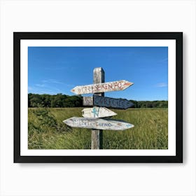 A Weathered Wooden Signpost At A Crossroad Its Arrows Pointing In Various Directions With Hand Pain (2) Art Print