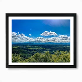 Cumulus Clouds Strewn Across A Blue Sky Above A Sweeping Scenic Landscape Vibrant Greenery Rollin (4) Art Print