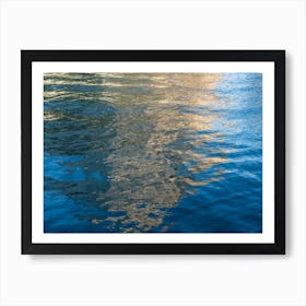 Golden-yellow reflections in blue sea water 1 Art Print