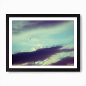 Silhouette Of An Airplane Flying In Sunset Sky Art Print