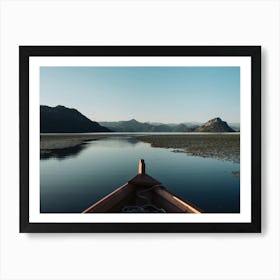 Boat on a lake reflection Art Print