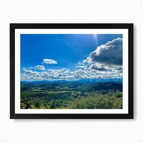 Cumulus Clouds Strewn Across A Blue Sky Above A Sweeping Scenic Landscape Vibrant Greenery Rollin (6) Art Print