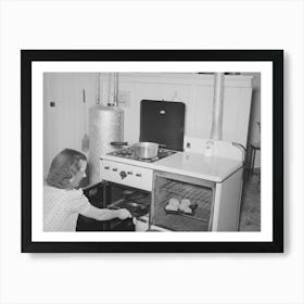 Wife Of Member Of The Casa Grande Valley Farms Working At Range In Her Kitchen, Pinal County, Arizona By Russ Art Print