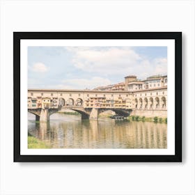 Florence, Italy I Pastel Ponte Vecchio on the Arno to experience dolce vita in Tuscany in sunny to retro vintage atmosphere photography with an Italian summer yellow sunny aesthetic like an old Mediterranean village Art Print