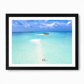 Two People Walking On A Beach Art Print