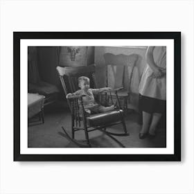 One of L,H, Nissen's children in rocking chair,Nissen shack near Dickens, Iowa Art Print