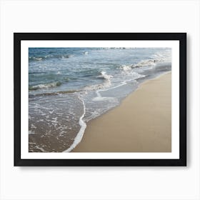 Sea water, waves and sandy beach Art Print