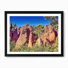 Ochres Land Majestic Cliffside Forest. This image showcases a stunning cliffside landscape adorned with lush green trees. The rocky formations exhibit a range of warm hues, from sandy yellows to deep reds, creating a striking contrast against the vibrant blue sky. The scene captures the beauty of nature's rugged terrain and the resilience of trees growing on steep, rocky surfaces. 6 Art Print