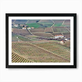 Langhe Rolling Vineyards in Early Spring. Langhe, Italy. An aerial view of beautifully contoured vineyards, showcasing rows of neatly planted vines stretching across rolling hills. The alternating shades of green and earthy tones create a mesmerizing pattern, highlighting the precision and artistry of vineyard cultivation. This serene landscape captures the essence of rural life in a wine-producing region. 4 Art Print