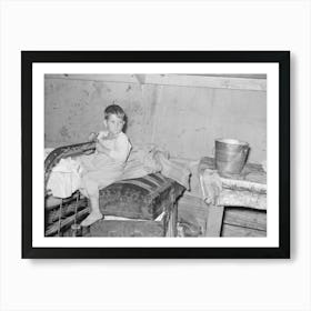 Son Of White Migrants Sitting On Trunk In Tent Home, Weslaco, Texas, See Caption 32108 D By Russell Lee Art Print