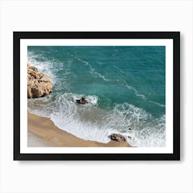 Aerial view of waves and foaming sea water on the beach Art Print