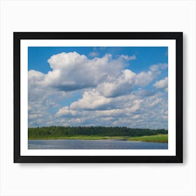 Cloudy Sky Over A Lake Art Print