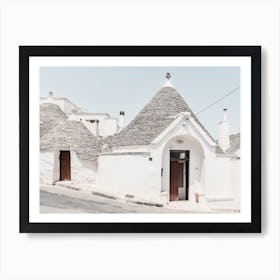 Street scene of trulli in Alberobello Art Print