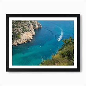 Boat arrives in a Mediterranean bay Art Print