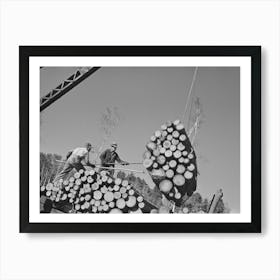 Loaders Pushing Logs Into Place While Loading Car, Lumbercamp Near Effie, Minnesota By Russell Lee Art Print