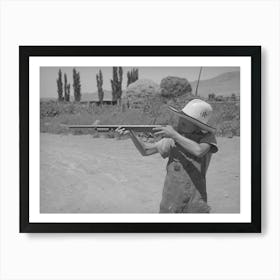 Mormon Farm Boy Shooting Air Rifle, Box Elder County, Utah By Russell Lee Art Print