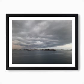 Storm Clouds Over The Water Art Print