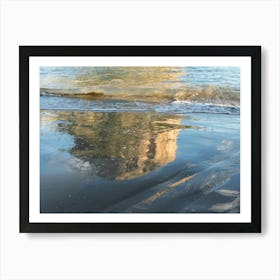 Reflection of a rock on the sandy beach Poster