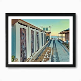 Coastal Row of Doors of Dressing Rooms. The image depicts a narrow, tiled pathway leading towards a waterfront. On one side, a row of white buildings with wooden doors line the path. The doors are a mix of weathered brown and white, adding a touch of rustic charm. The path is made of blue and white tiles, with a subtle pattern, and the ground is slightly damp, suggesting recent rain. Art Print