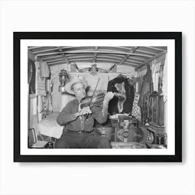 Mr, Bias Playing The Fiddle In His Trailer Home, He Is A Former Cowboy Who Travels Over The Country, He Has A Small Art Print