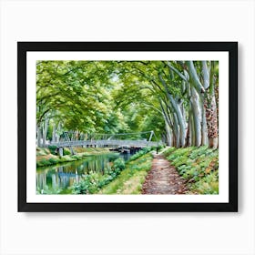 Tranquil Pathway near Canal de Brienne in Toulouse France. This image depicts a serene riverside scene with a narrow dirt path running alongside a calm river. The path is bordered by lush greenery and vibrant flowers, leading to a modern pedestrian bridge that spans the river. Tall trees with dense foliage arch over the path and river, creating a canopy of green. The reflection of the trees and bridge in the water adds to the tranquil atmosphere. Art Print