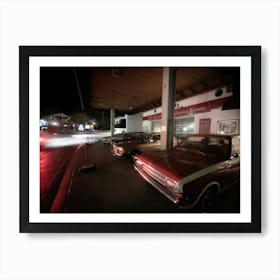 Old red cars and street lights Art Print