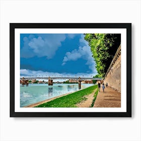 Garonne Riverside Walkway with Bridge in Toulouse. Toulouse, France. The image depicts a serene riverside walkway with a bridge in the background. The sky is partly cloudy, and the water reflects the blue hues of the sky. On the right side, there is a brick wall with greenery above it, and a few people are walking along the path. Art Print