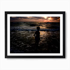 Young Boy Looking At The Sunset Art Print