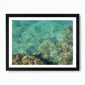 Clear, turquoise sea water and rocks Art Print