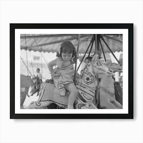 Little Girl On The Merry Go Round Horse, Fiesta, Taos, New Mexico By Russell Lee Art Print